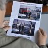 Lilli Hospes schaut sich alte Bilder von der ersten Ampel in Marktheidenfeld an.                                   Foto: Laura-Sophie Lang