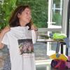 Zur Erinnerung an Schwarzach gab es als als besonderes Abschiedsgeschenk ein T-Shirt mit dem Foto der gesamten Mittagsbetreuungsgruppe.