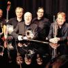 Die Band Woodhouse hat ihre Arbeit in der Ära des Stilpluralismus auf ein breites Musikspektrum wie Dixieland, Modernem Swing, Mainstream, Blues, Samba und Bossa-Nova ausgerichtet.