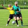 Alexandra Muck (grünes Trikot, SG Dittwar/Tauberbischofsheim) im Zweikampf.