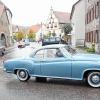 Oldtimer – hier angeführt von einem Borgward – rollen während des Kreisheimattags durch Obernbreit.