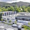 Überragende Dreifachsporthalle: Der Neubau (links) dominiert das TGWH-Vereinsgelände mit kleinen Halle, Tennishalle und Neubert-Parkplatz (vorne).