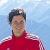 Lohn für die Strapazen: Nadine Richter, die in der Gesamtwertung des Women's Trail den zweiten Platz belegte, vor dem Alpenpanorama.