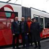 Rote Schleife an der Straßenbahn: Das 25-jährige Bestehen der Aids-Beratung Unterfranken feierten (von links) Leiter Michael Koch, Augustinerpater Dominik, Marco von der Beratungsstelle und Prälat Karl Rost.FOTO Norbert Schwarzott
