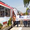 Bei der Zugtaufe der Westfrankenbahn von links: Linda Trabold vom Tourismusverband „Liebliches Taubertal“, Westfrankenbahn-Sprecher Denis Kollai, Landrat Reinhard Frank, Westfrankenbahn-Projektleiter Thomas Herold, Jochen Müssig, Geschäftsführer des Tourismusverbands „Liebliches Taubertal“, Hans Otto Lausberger, Marketingleiter Westfrankenbahn und Christina Weber vom Tourismusverband „Liebliches Taubertal“.