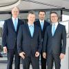 Von links: Die Vorstandsmitglieder Reiner Türk, Michael Reif und Markus Merz mit Michael Kopmann (Leiter der Privatkundenstrategie bei der DZ Bank).
