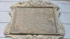 Eine Sandsteingedenktafel an der Westfassade der Ritterkapelle erinnert seit über 400 Jahren an das machtvolle Wirken des Würzburger Fürstbischofs Julius Echter in der Amtsstadt Haßfurt.