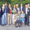 Erinnerungsbild 20 Jahre Zerspanungstechnik Weinbeer: Von links: Gerhard Eck (Staatssekretär), Tobias Weinbeer (Junior-Chef) mit Sohn Tim, Melanie Weinbeer, Sonja Weinbeer (Senior-Chefin), Gudrun Tielesch (Dritter Bürgermeister), Klaus Schenk (Erster Bürgermeister), Franz Josef Weinbeer (Senior-Chef), Winfried Meißner (Zweiter Bürgermeister), Stefanie Fuchs, Karl Fuchs;  vorne sitzend Ella Weinbeer (Mutter des Senior-Chefs) sowie die beiden Urenkel Dominik und Lena.