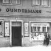 In der Bahnhofsstraße: Die Firmenfassande vor der Zerstörung 1945.