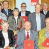 Ehrungen für langjährige Treue zur SPD: Anlässlich des 60.Geburtstags des SPD-Ortsvereins Bad Königshofen wurden zahlreiche Mitglieder ausgezeichnet. Im Bild (sitzend von links) Sieglinde Hofmann, Maria Hennig, Franz Jahrsdörfer und Karl Hillenbrand, (dahinter von links) Rosi Polzer, Hilmar Köhler, Johann Treubert, Gertrude Tschochner, Friedrich Oehm, Dieter Birkel, Willi Göbel, Angelika Wilimsky sowie Matthias Kihn, Vorsitzender des SPD-Unterbezirks Rhön-Haßberge, und die Bundestagsabgeordnete Sabine Dittmar.