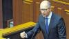 Bleibt im Amt: Nachdem die Abgeordneten vor einer Woche neue Steuergesetze zur Finanzierung des Bürgerkrieges in der Ostukraine abgelehnt hatten, erklärte der ukrainische Regierungschef Arseni Jazenjuk seinen Rücktritt. Das Parlament in Kiew lehnte sein Gesuch ab.