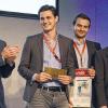 Sieger beim Businessplan-Wettbewerb Nordbayern (von links): Siemens-Vorstandsmitglied Klaus Helmrich gratuliert Artur Schlaht, Viktor Butsch und Martin Saigger vom Würzburger Start-Up payever.