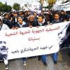 Lautstarke Proteste in Tunis: Nach der Ermordung von Chokri Belaid demonstrieren Anhänger des Oppositionspolitikers in der tunesischen Hauptstadt mit einem Plakat, das dessen Bild zeigt. Belaid soll an diesem Freitag beerdigt werden.