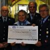 1000 Euro übergaben (von links) Hans Grosch, Gerhard Dörflein und Norbert Henning an Monika Demmich für die Regenbogenstation in Würzburg.