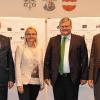 Laden herzlich zum Landesfestumzug am Sonntag um 13.30 Uhr nach Bad Mergentheim ein (von links): Oberbürgermeister Udo Glatthaar, Sabine Mangold (Geschäftsstelle Heimattage der Stadt), Andreas Schüle (Staatsministerium) und Kersten Hahn (Verkehrsdirektor und Kulturamtsleiter der Stadt).