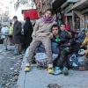 Kinder in Aleppo warten auf die Evakuierung. Die Lage in der zerstörten syrischen Stadt ist verheerend.