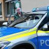 Polizeihauptkommissar Norbert Köhler, Polizeioberkommissar Peter Schlembach und ihr neuer BMW.