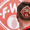 Fan mit kreativer Idee: Jürgen Spiegel aus Bieberehren hat sich das Kickers-Logo ins Haar rasieren und färben lassen.