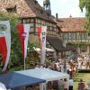 Musik, Tanz und Mundart erwartet die Besucher beim unterfränkischen Volksmusiktag im Kirchenburgmuseum. Unter anderem ist die Bühne am Dorfplatz einer der Schauplätze.
