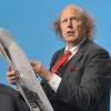 Arnulf Rating liest Zeitung - und macht sich Gedanken.