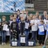 Siegerfoto: Ben Djalek (Mitte) Sieger in der Klasse ME (6 bis 7 Jahre) mit seinen Mitstreitern. Foto: Rainer Weis