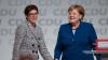 Germany's conservative Christian Democratic Union (CDU) newly elected leader Annegret Kramp-Karrenbauer (L) is congratulated by German Chancellor Angela Merkel (R) during the CDU congress on December 7, 2018 at a fair hall in Hamburg, northern Germany. - Annegret Kramp-Karrenbauer, a close ally of German Chancellor Angela Merkel, on Friday won a party vote to succeed the veteran leader at the helm of the centre-right CDU. (Photo by Odd ANDERSEN / AFP)