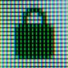 Einzelne Pixel auf einem Computermonitor bilden ein Vorhängeschloss als Symbol für Sicherheit. Einzelne Pixel auf einem Computermonitor bilden ein Vorhängeschloss als Symbol für Sicherheit.