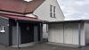 Die Container für den lang ersehnten Jugendraum in Wonfurt (rechts) und der Anbau an das Feuerwehrgerätehaus mit den sanitären Anlagen (links) sind bereits errichtet. Ende Oktober soll die Einweihung mit der offiziellen Übergabe an die Jugend stattfinden.
