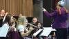 Ein mächtiges Orchester führt Adrian Blüm mit dem Dirigentenstab. Ein mächtiges Orchester führt Adrian Blüm mit dem Dirigentenstab.