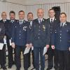 Landrat Thomas Habermann und Kreisbrandrat Stefan Schmöger (rechts) überreichten das staatliche Ehrenzeichen an zahlreiche Feuerwehrleute.