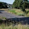 In der Nähe des Sportgeländes am "Schwarzen Weg" wurde die Straße abgesenkt, damit der Ebelsbach bei Hochwasser sogar über die Straße abfließen kann. In der Nähe des Sportgeländes am "Schwarzen Weg" wurde die Straße abgesenkt, damit der Ebelsbach bei Hochwasser sogar über die Straße abfließen kann.