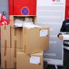 Samuel Zehelein, Leiter Servicestelle Ehrenamt BRK Kreisverband Main-Spessart (links), und Florian Schüßler, Leiter Soziale Dienste BRK Kreisverband Main-Spessart, mit den gespendeten Masken.