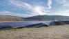 Solaranlagen produzieren CO2-freien Strom, doch große Freiflächen sind mittlerweile wegen des Landverbrauchs in die Kritik geraten.