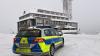 Polizisten kontrollieren die 15-Kilometer-Regel auf dem Fichtelberg.