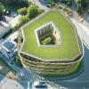 Exponierte Lage und eine pfiffige Gestaltung: So soll das geplante Geschäftshaus von Archicult GmbH am Höchberger Ortseingang mal aussehen. 