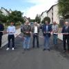 Über die sanierte Obersteinbacher Straße in Untersteinbach fließt der Verkehr wieder. Darüber freuen sich (von links) Pfarrer Kurt Wolf, Martin Barthelme (Müller Hoch- und Tiefbau), Marco Behringer (Tiefbau Landkreis Haßberge), MdL Steffen Vogel, Markus Hopfengärtner (Ingenieurbüro SRP), Bürgermeister Matthias Bäuerlein, Hugo Schüßler (Newo-Bau), Landrat Wilhelm Schneider und Alfons Schanz, der Leiter der Tiefbauverwaltung im Landkreis Haßberge.