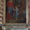 Kerzen und Bilder der PatronInnen der Landsmannschaften vor dem Altar der Heimat.