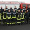 Das Bild zeigt die neuen Atemschutzgeräteträger zusammen mit ihren Ausbildern und Lehrgangsleiter Ralf Weippert (stehend hinten links).