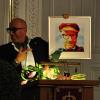 Designer Thomas Rath (mit Kunst-Portrait von Gerd Michel).