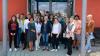 Das Foto zeigt Schülerinnen und Schüler der Q11 zusammen mit Referentinnen und einem Referenten des Huckepack-Tages sowie LSH-Lehrkräften und Schulleiter Achim Höfle.
