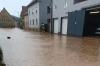 Fuchsstadts Ortsmitte stand am frühen Donnerstagabend bis zu einem halben Meter unter Wasser.