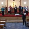 Der Kammerchor der Musikschule Gemünden mit dem Chorleiter Michael Albert.