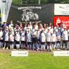 "Fußballcamper" mit ihren Trainern und Betreuern.