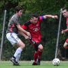 Duell um den Ball zwischen Florian Stumpf vom TSV Aubstadt III (Mitte) und Janik Schmitt (links) von der SG Burgwallbach/Leutershausen.