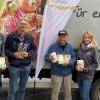 Jürgen Fischer, Ekkehard Messow, Andreas Mensing und Sarah Fischer bei der Spendenübergabe