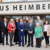 Freude über den gelungenen Neubau bei der Einweihung von Haus Heimberg (von links): Bruder Peter Berg, Diözesan-Caritasvorsitzender Matthias Fenger, Bürgermeisterin Anette Schmidt, Bruder Alfons Maria Michels, Landtagsvizepräsident Wolfgang Reinhart, Geschäftsführer Marc Reggentin, Landrat Christoph Schauder, Heimbeiratsvorsitzende Elisabeth Wettengel, Geschäftsführer Thomas Wigant, Pflegdienstleiterin Carina Möldner, Einrichtungsleiter Marcel Hofmann, Hausoberin Stefanie Krömker.