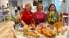 Hinter dem liebevoll gestalteten "Emmaus-Mahl-Tisch"  mit Osterkerze, Speisen und Osterhefezöpfen im Bild hinten (von links): die Mitarbeiterinnen Claudia Rossmark-Klein, Beate Schmitt und Bereichsleitung  Franziska Grab.