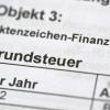 Grundstückseigentümer in Burgsinn haben zum Jahr 2022 mehr Grundsteuern zu entrichten, weil die Gemeinde den Hebesatz erhöhte. Dagegen wollte ein Bürger klagen (Symbolbild).
