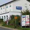 Die Werbetafel an der Einfahrt ins Gewerbegebiet Erbshausen-Sulzwiesen ist zu klein geworden. Die Gemeinde Hausen wird sie um sieben weitere Felder vergrößern.