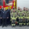 Gruppenfoto mit Ausbilder, Teilnehmern und den Prüfern.